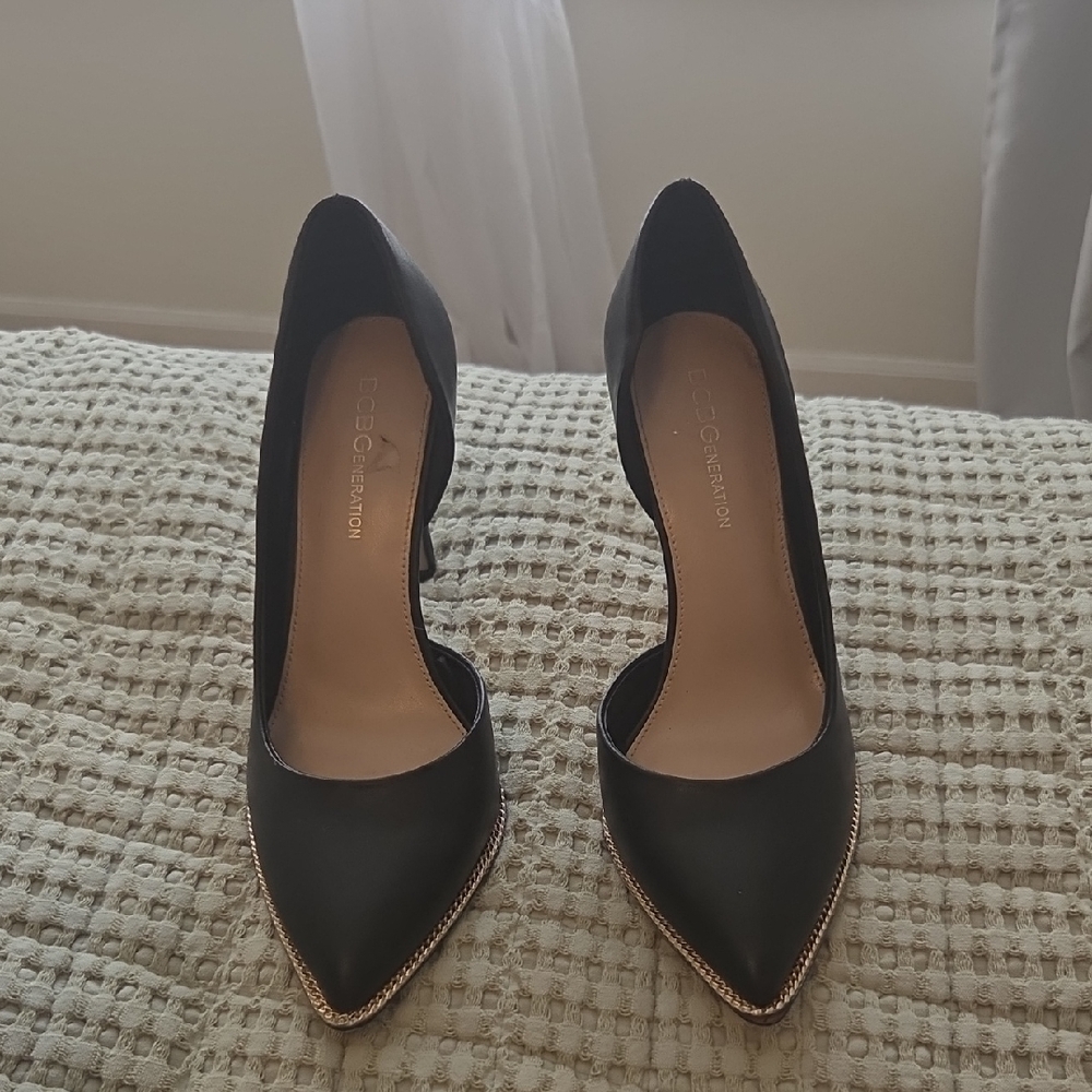 BCBGeneration Black and Gold Pointed Toe Heels